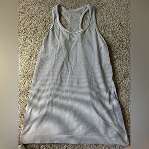 lululemon black and white swiftly tank top size 6!